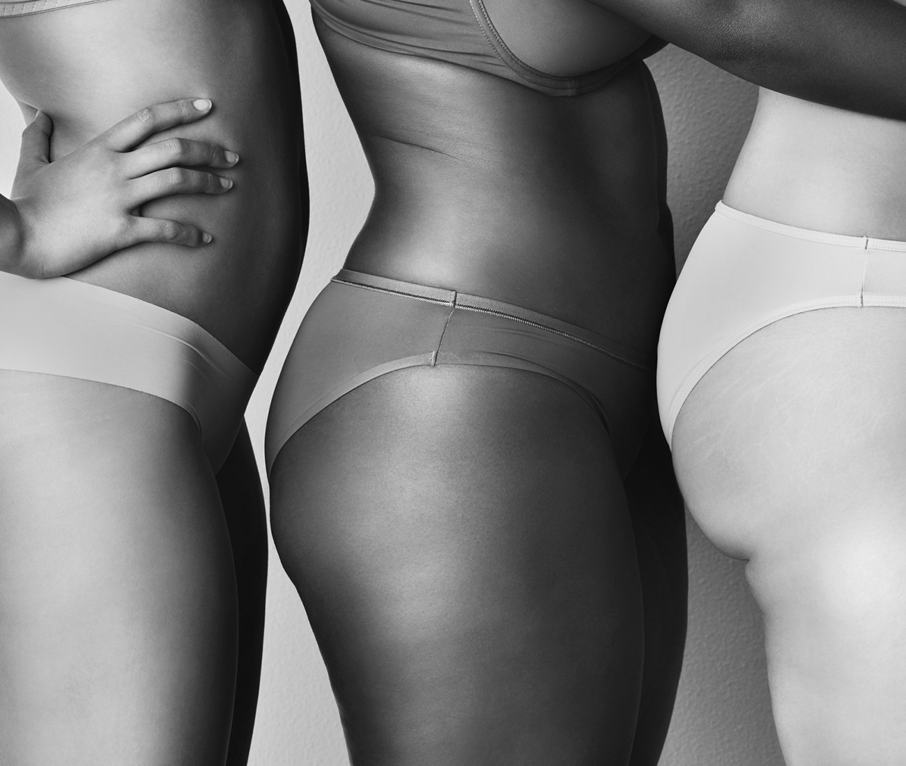 Photo Of Three Women Front To Back, Showing Their Torsos, Black And White Photo