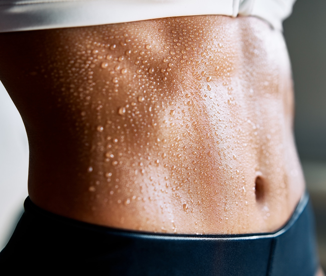 Close Up Of Sweating Person's Abdomen