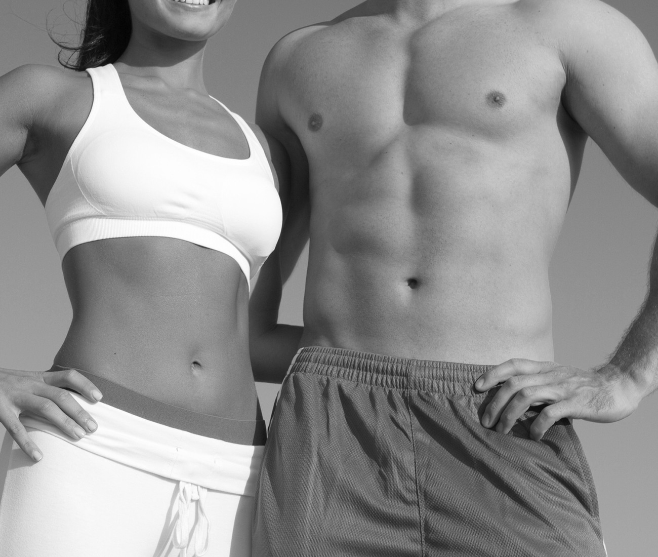 Man And Woman Posing Together In Active Wear Clothing